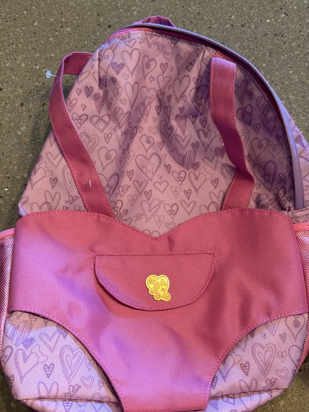 Pink Heart-Pattern Kids Backpack with Decorative Gold Emblem